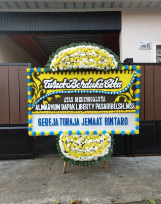 Papan Bunga Duka di Mado